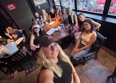 A group of young people enjoying a night out at restaurant