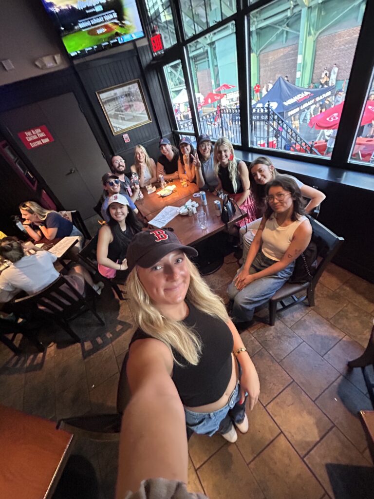 A group of young people enjoying a night out at restaurant